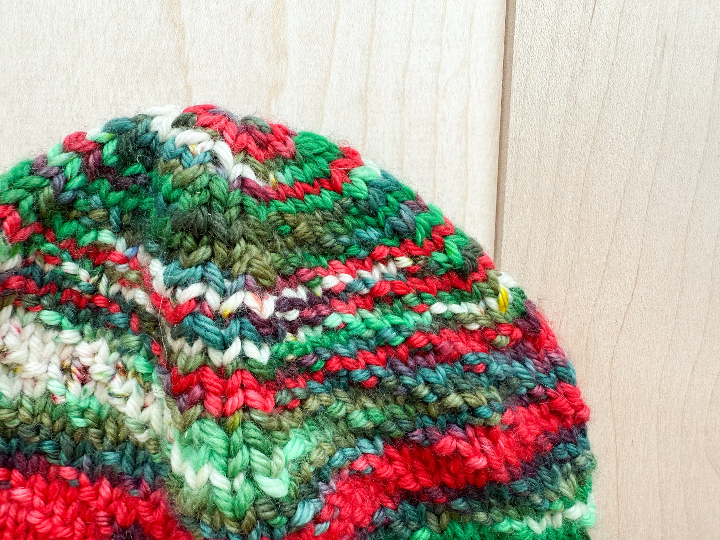Handmade Festive Red, Green, and White Spiral Beanie Using 100% Superwash Merino Wool