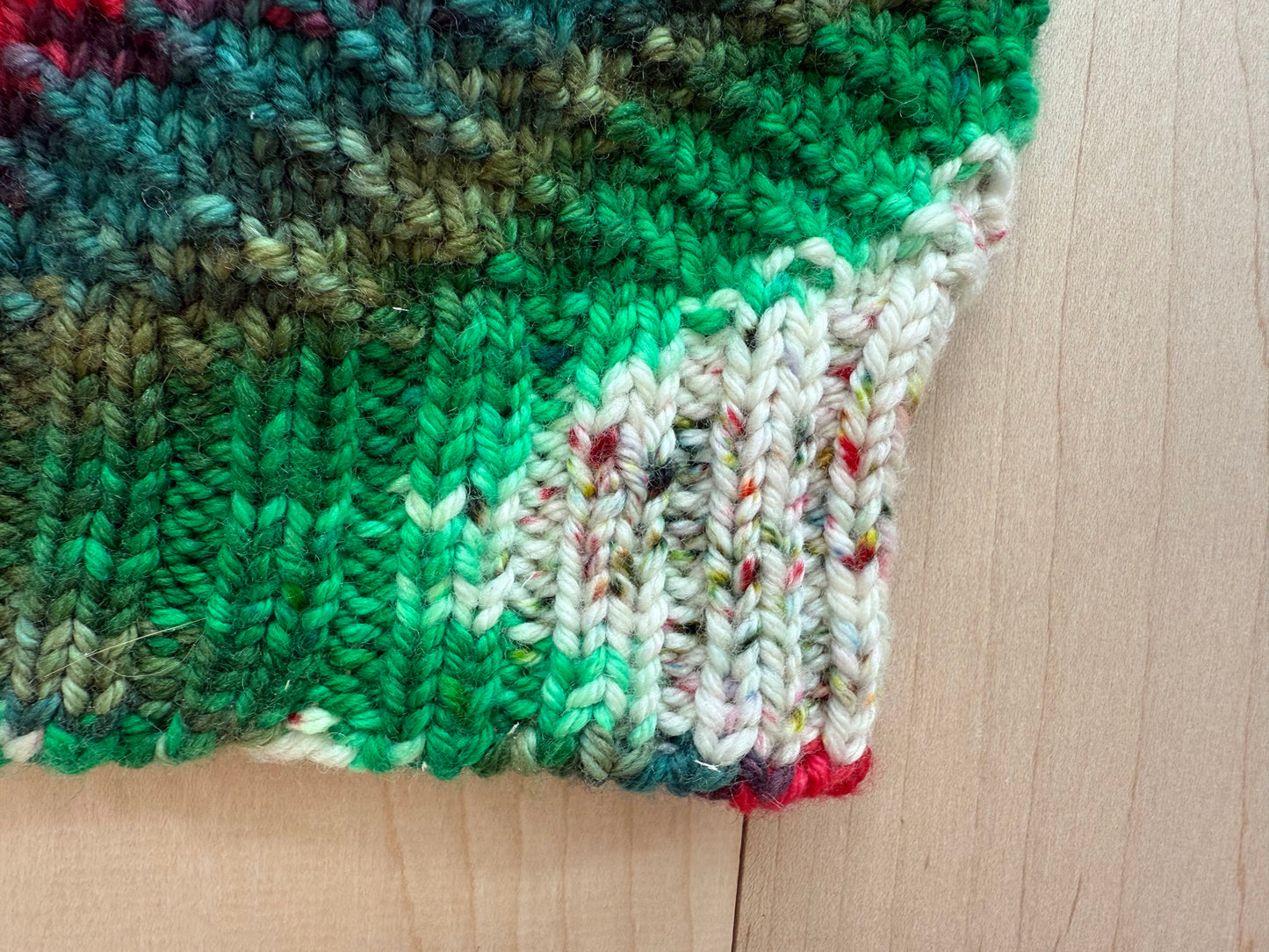 Handmade Festive Red, Green, and White Spiral Beanie Using 100% Superwash Merino Wool