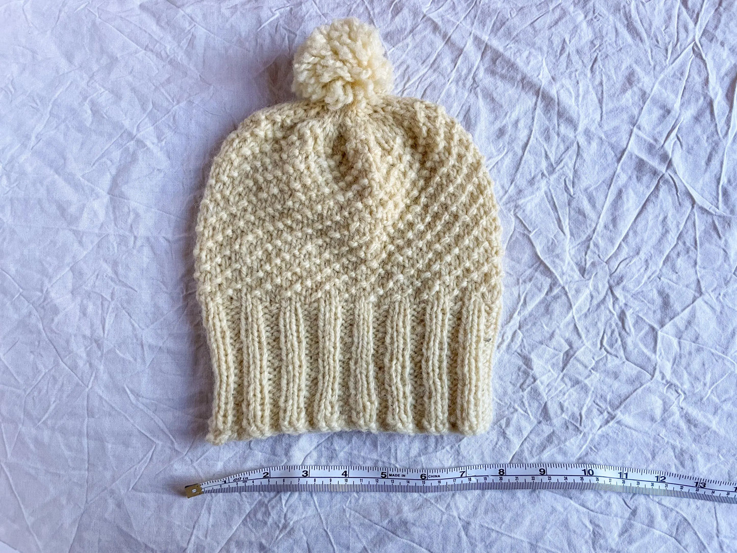 Handmade Cream Pom-Pom Beanie Using 100% Secondhand Yarn