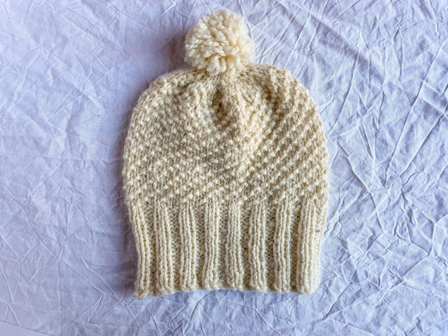 Handmade Cream Pom-Pom Beanie Using 100% Secondhand Yarn