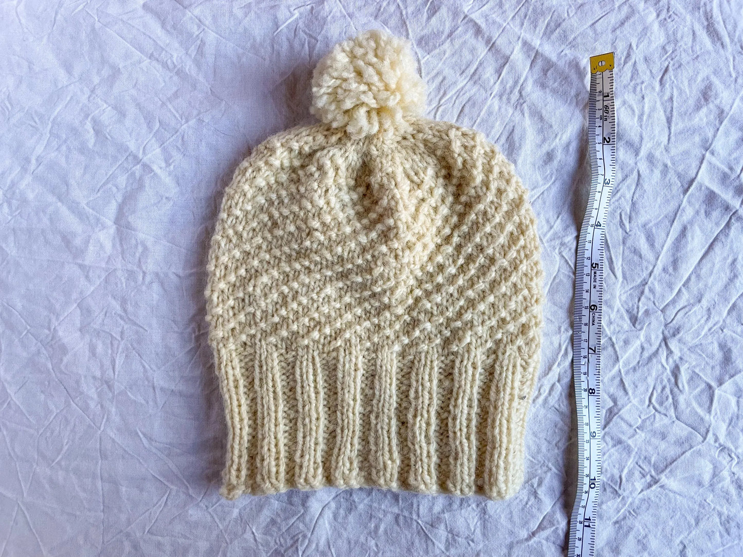 Handmade Cream Pom-Pom Beanie Using 100% Secondhand Yarn