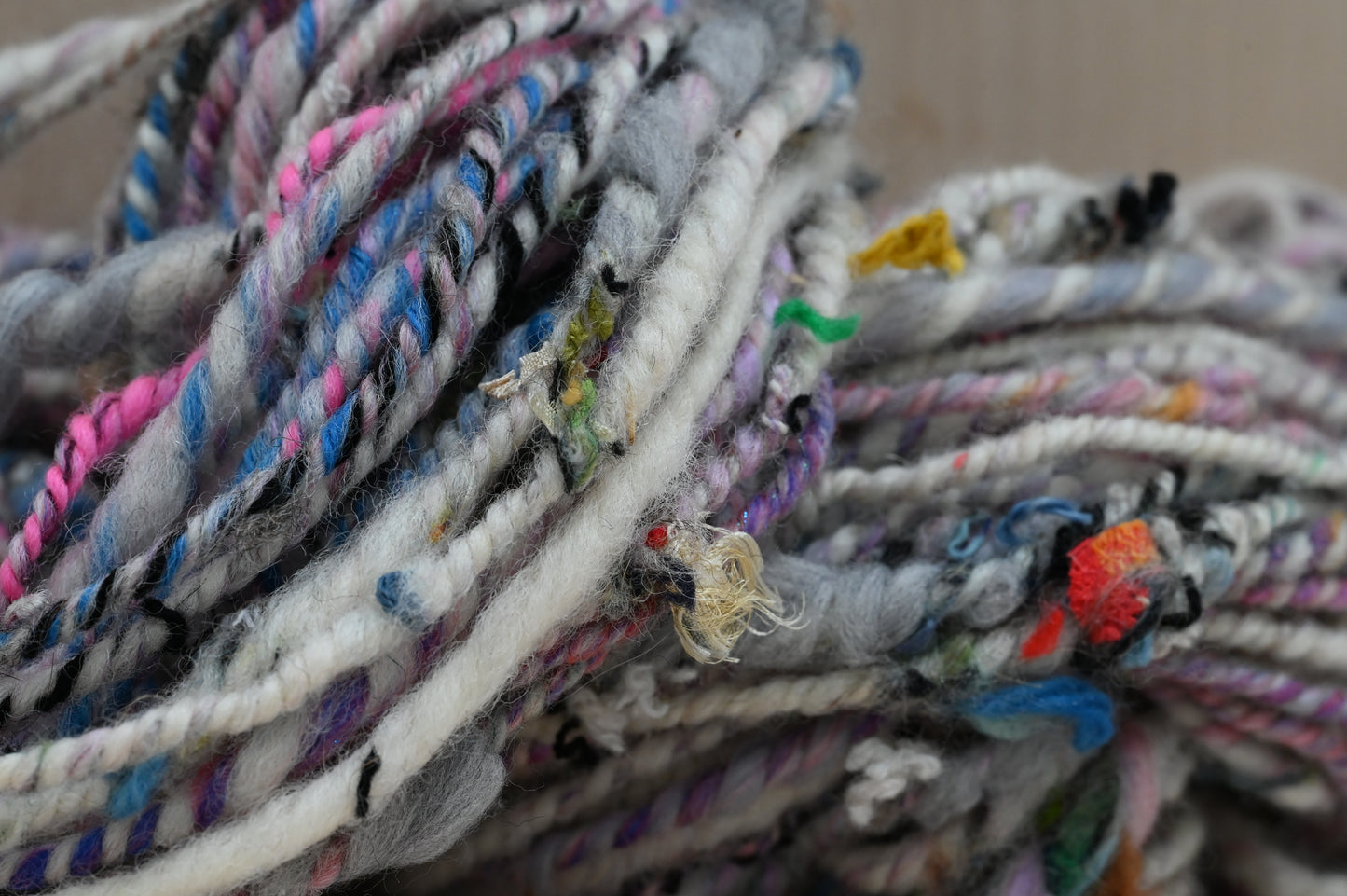 Handspun Fuzzy White, Pink, and Multicolor Textured Art Yarn Using 100% Upcycled Materials