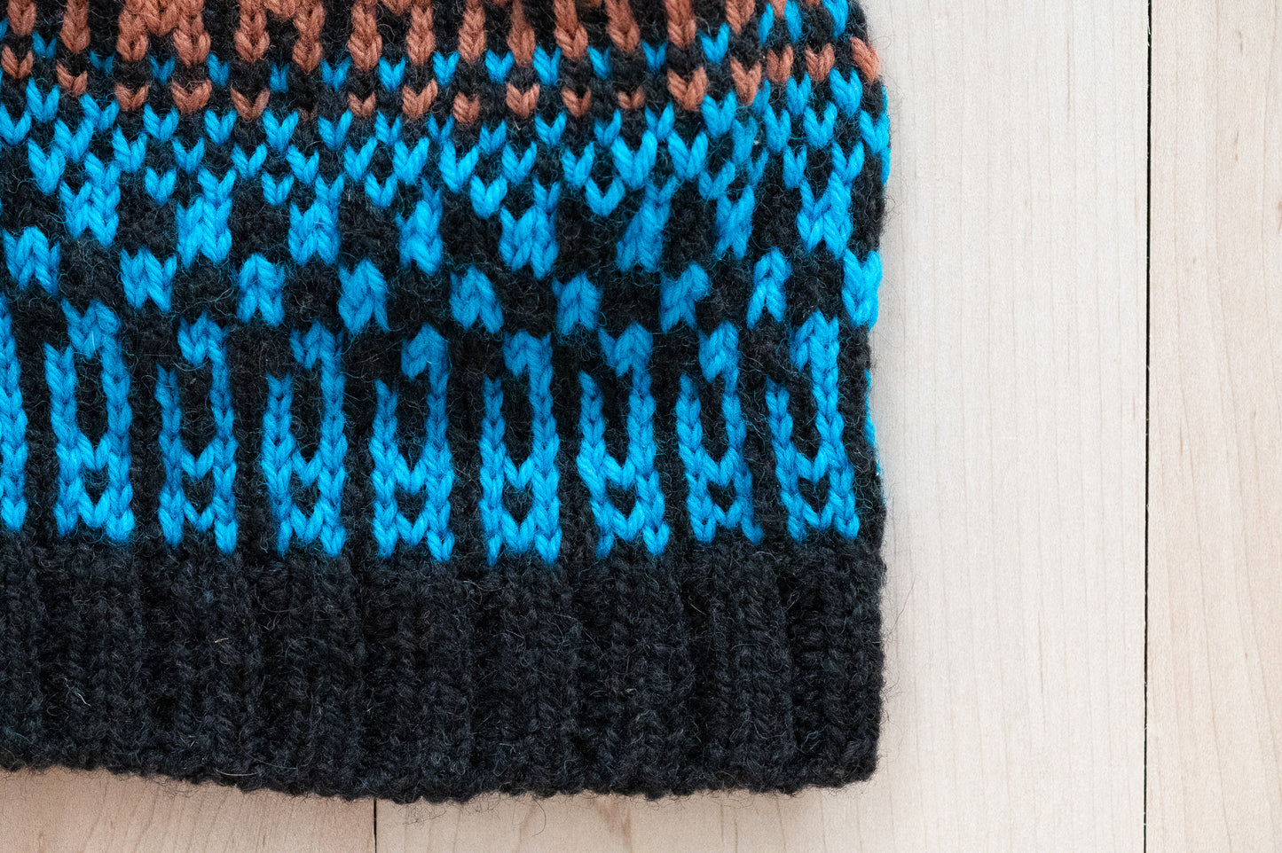 Handmade Multicolor Black, Blue, and Brown Hat Using 100% Secondhand Wool