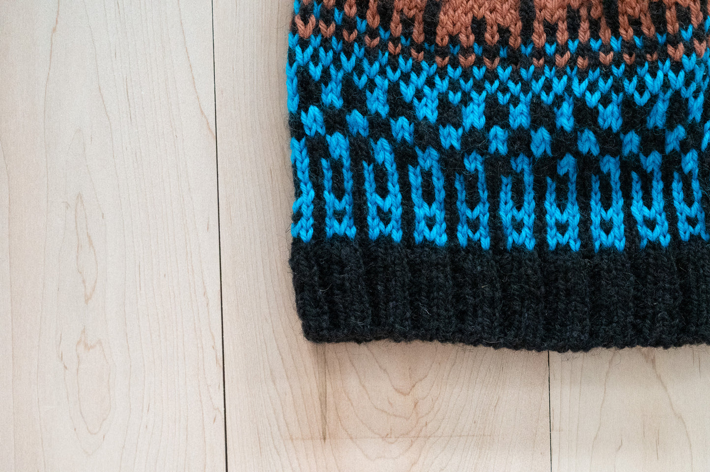 Handmade Multicolor Black, Blue, and Brown Hat Using 100% Secondhand Wool
