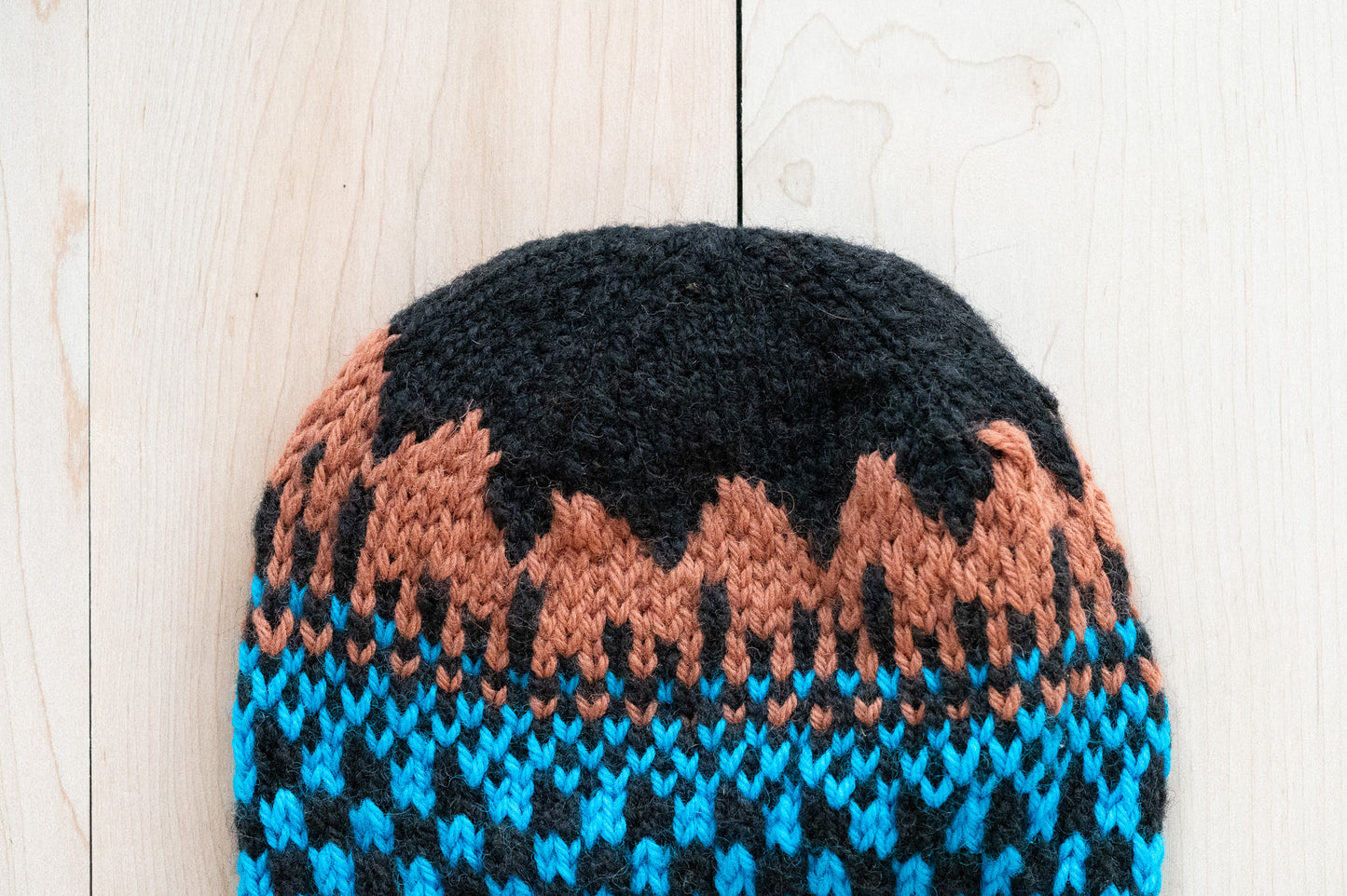 Handmade Multicolor Black, Blue, and Brown Hat Using 100% Secondhand Wool