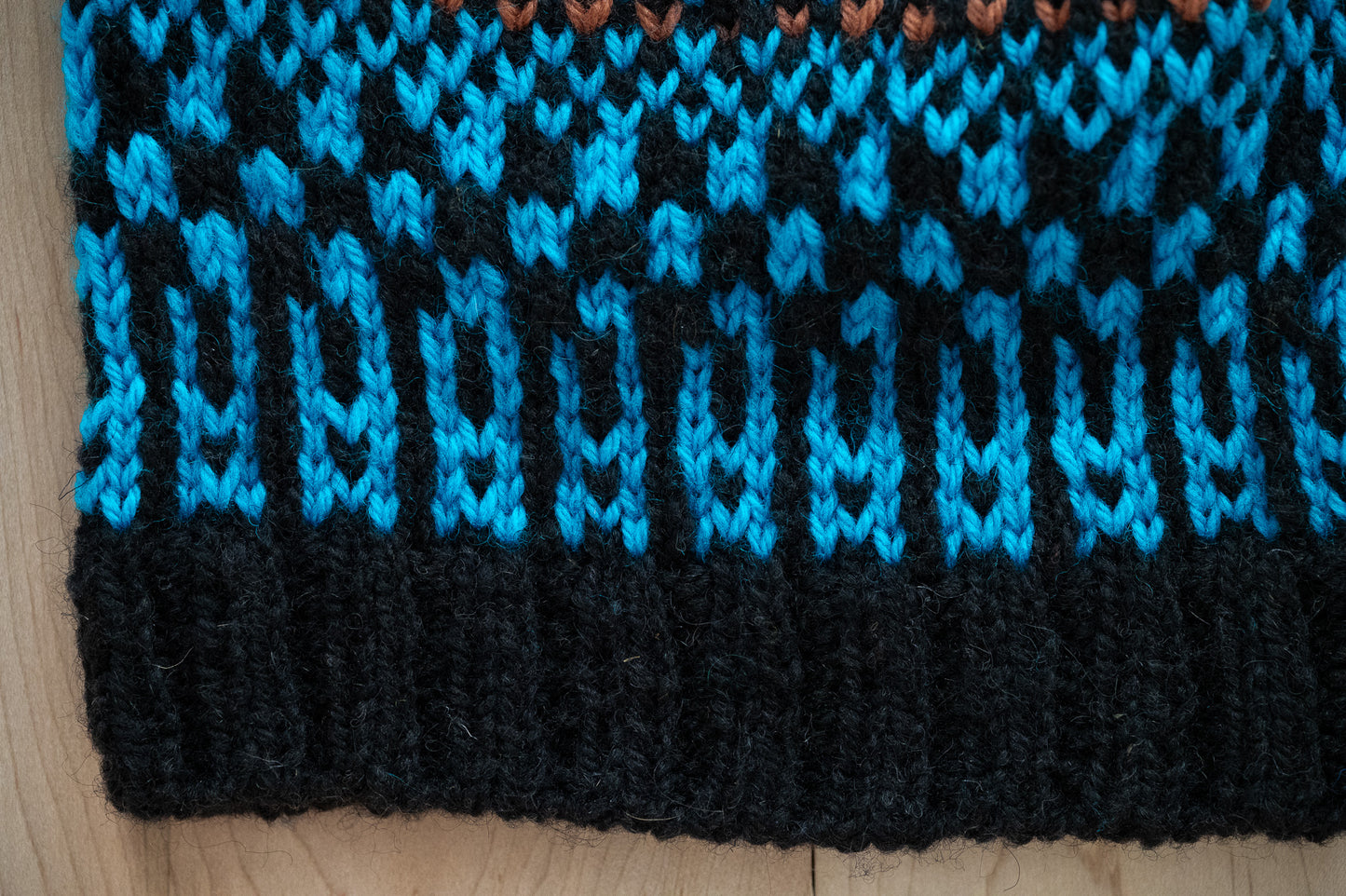 Handmade Multicolor Black, Blue, and Brown Hat Using 100% Secondhand Wool